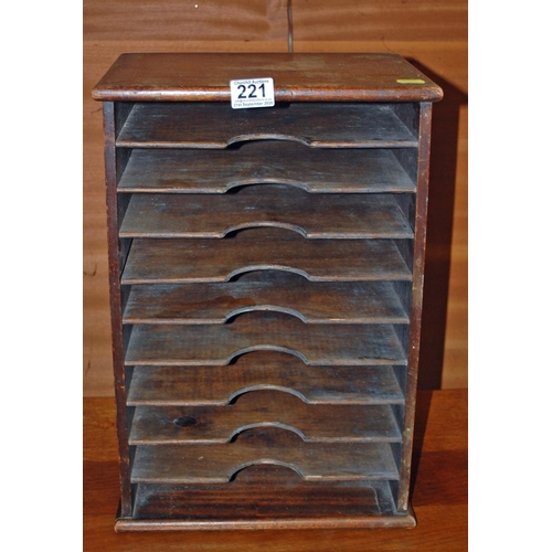 221 - A vintage wooden desktop filing cabinet - Postage/packing not available.