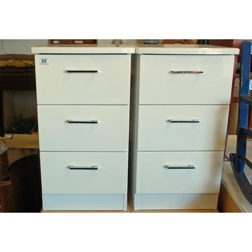 69 - Pair of modern white 3 drawer bedside cabinets - Postage/packing not available.