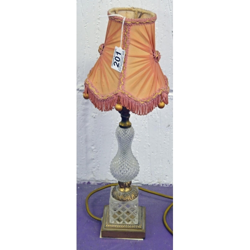 201 - A glass and brass table lamp - Postage/packing not available.