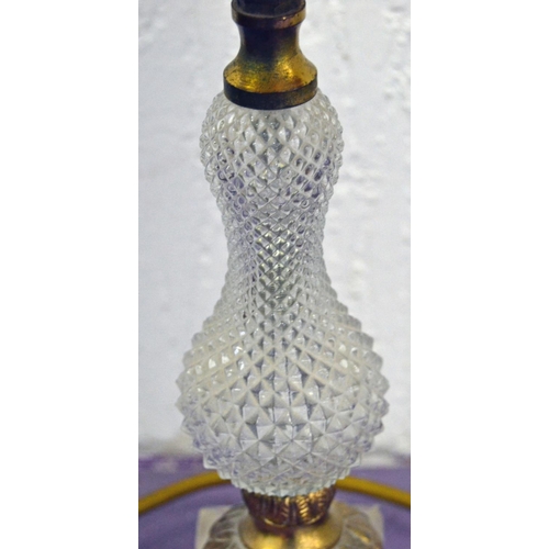 201 - A glass and brass table lamp - Postage/packing not available.
