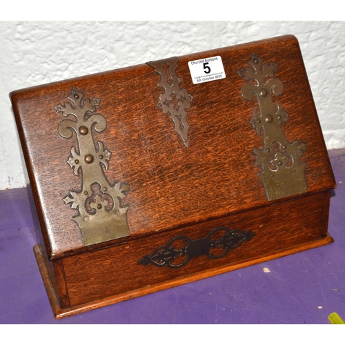 5 - An antique Oak Gothic Revival style desk top stationary box with brass straps