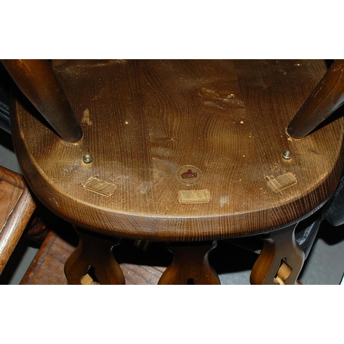 61 - A set of 4 Ercol Fleur-de-Lys dining chairs - Postage/packing not available.