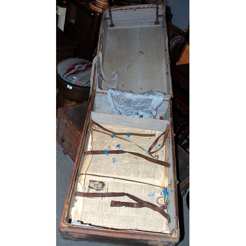 62 - Vintage leather travelling trunk - Postage/packing not available.