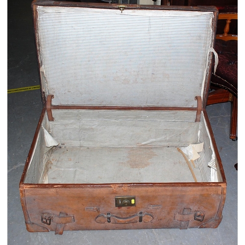 65 - Vintage leather travelling trunk with labels - Postage/packing not available.
