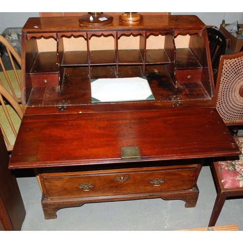 75 - A George III mahogany bureau - Postage/packing not available.