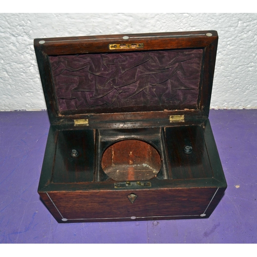 338 - A Victorian Rosewood tea caddy with Mother of Pearl inlay - Postage/packing not available