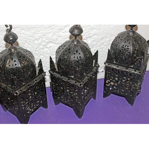 297 - 3 Moroccan style metal hanging lamps and one other - Postage/packing not available