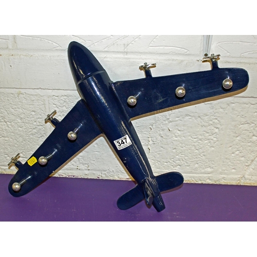 347 - A metal set of coat hooks formed as a plane - Postage/packing not available