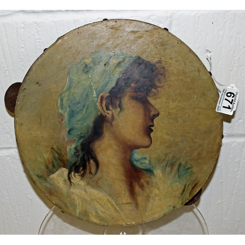 671 - A 19th century tambourine with hand painted picture