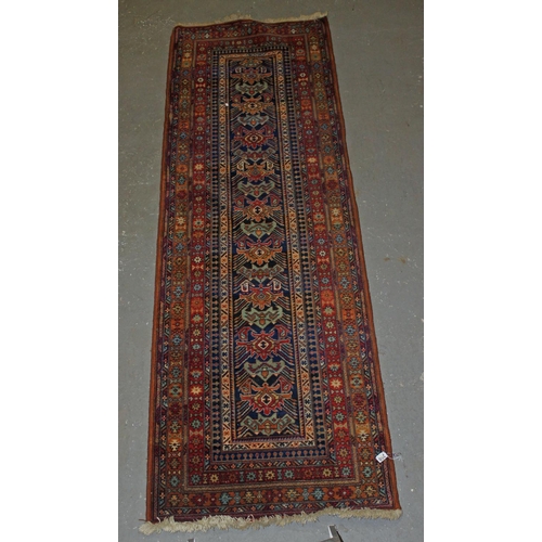 260 - A large multi-coloured Samarkand runner rug