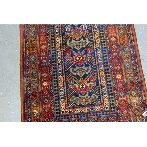 260 - A large multi-coloured Samarkand runner rug