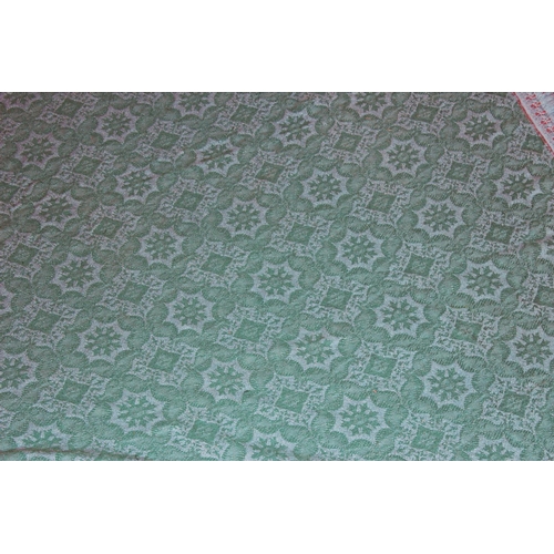 263 - A large vintage turquoise reversible bed throw