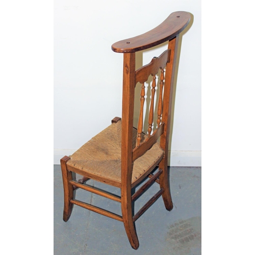 72 - An early 20th century Prie Dieu chair with rush seat - stamped Liberty & Co - Postage/packing not av... 