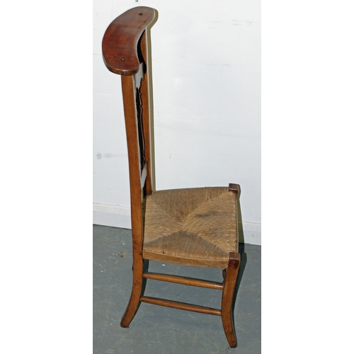 72 - An early 20th century Prie Dieu chair with rush seat - stamped Liberty & Co - Postage/packing not av... 