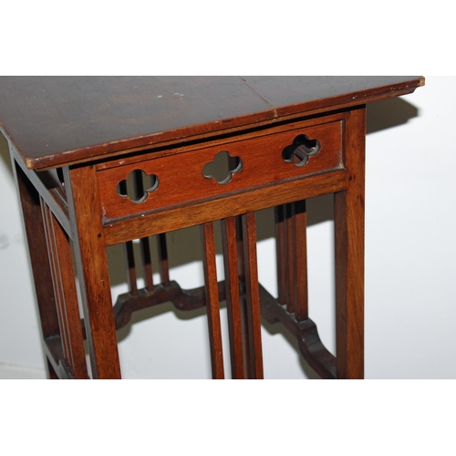 74 - An Arts and Crafts period small table in the style of Liberty - Postage/packing not available