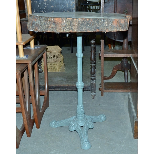 133 - Cast iron based table with wooden slab top - Postage/packing not available