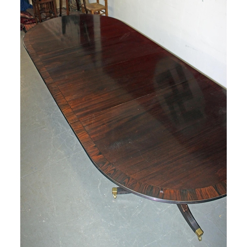 75 - A large Georgian style mahogany twin pedestal dining table with 2 leaves - Postage/packing not avail... 