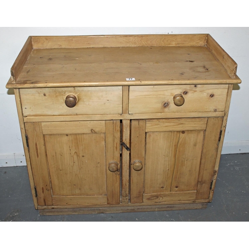 77 - An antique pine sideboard - Postage/packing not available