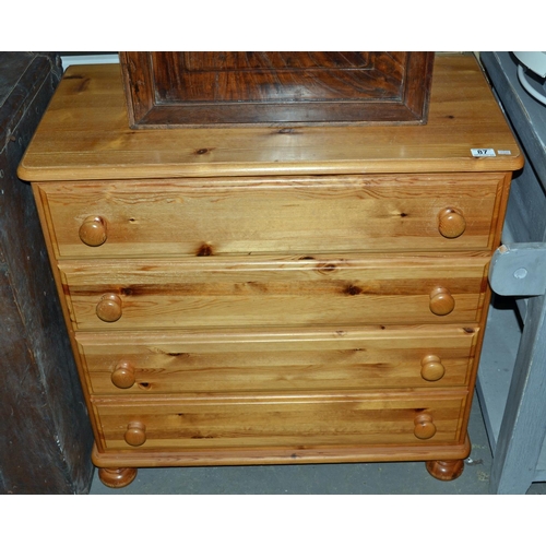 87 - 4 drawer pine chest of drawers - Postage/packing not available