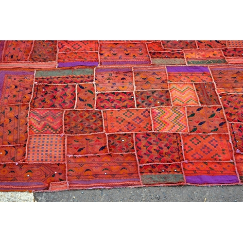 256 - A large Indian Shisha work embroidered patchwork wall hanging decorated with small mirrors