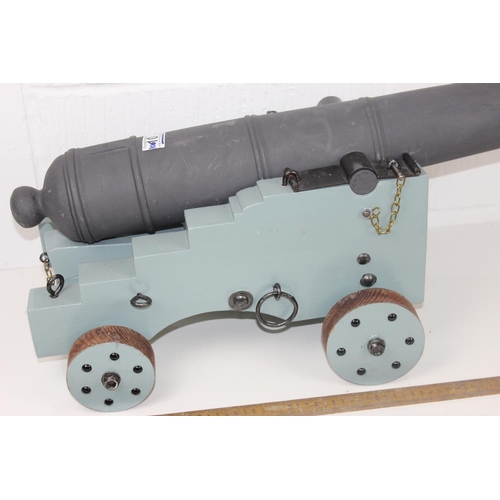 1010 - A 20th century scratch built wooden model of a cannon on cart - approx 1m in length