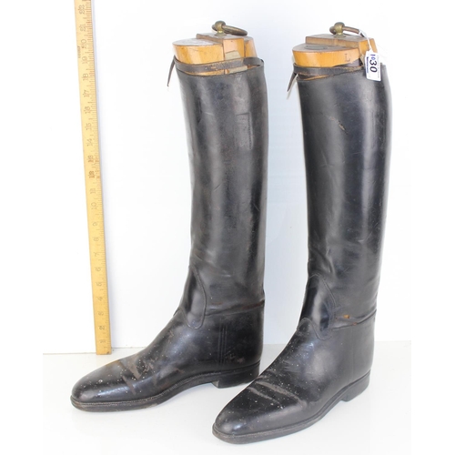 1030 - A pair of leather riding boots and trees by Bunting of London - likely military