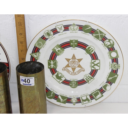 1040 - A pair of brass shell cases and 2 military plates by Coalport