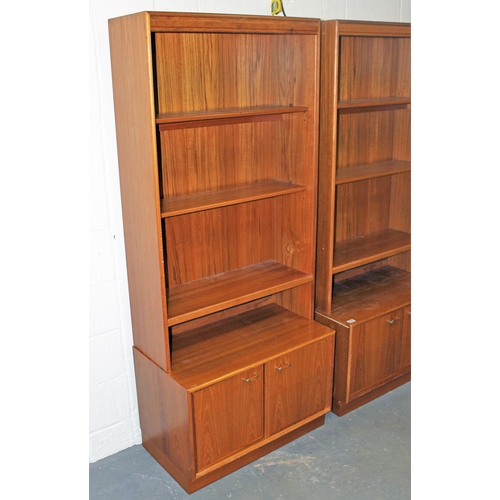 106 - A pair of Turnidge of London Limited - Teak Geneva display units