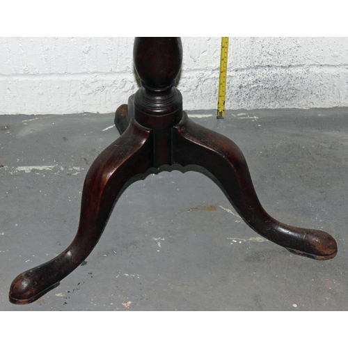 109 - An antique mahogany wine table