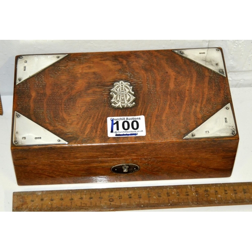 1100 - A silver mounted oak cigarette box with key - London 1901 by The Alexander Clark Manufacturing Co