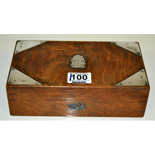 1100 - A silver mounted oak cigarette box with key - London 1901 by The Alexander Clark Manufacturing Co