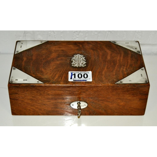 1100 - A silver mounted oak cigarette box with key - London 1901 by The Alexander Clark Manufacturing Co