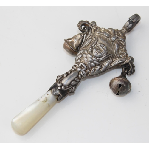 1114 - A continental silver embossed spoon (probably Dutch), a silver and Mother of Pearl baby rattle, Birm... 