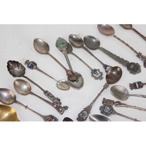 1121 - Qty of assorted souvenir spoons to inc white metal examples