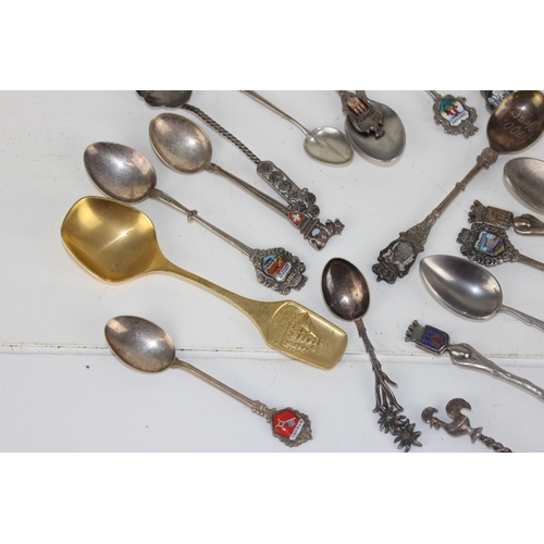 1121 - Qty of assorted souvenir spoons to inc white metal examples