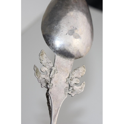 1122 - Qty of large white metal spoons in the manner of Roman spoons with decorated bowls and a similar sty... 