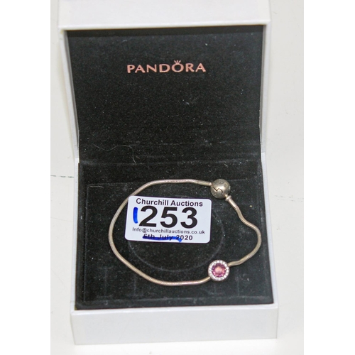 1253 - A Genuine Pandora bracelet with charm in box