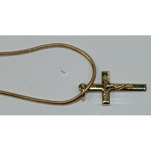 1255 - 9ct gold crucifix pendant on 9ct gold chain and 2 gold earrings - gross weight 7.9g