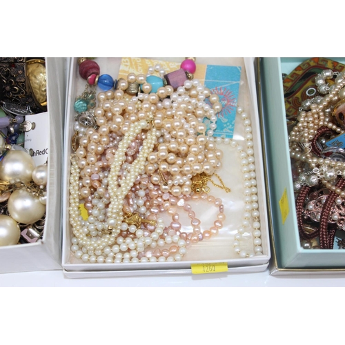 1260 - 3 boxes of assorted costume jewellery