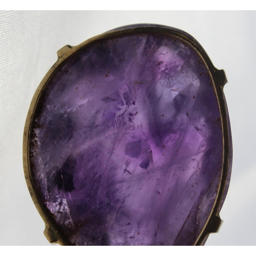 1264 - A large purple stone pendant (believed to be an uncut Amethyst) in a yellow metal mount marked 14k