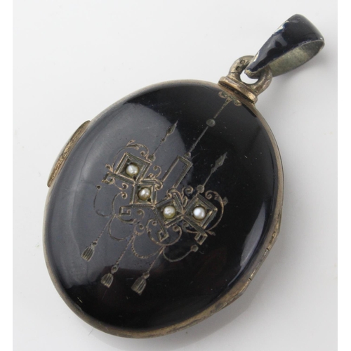 1265 - 2 antique pendants - one a black enamel and seed pearl set locket bearing indecipherable marks and t... 