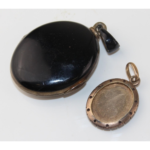 1265 - 2 antique pendants - one a black enamel and seed pearl set locket bearing indecipherable marks and t... 