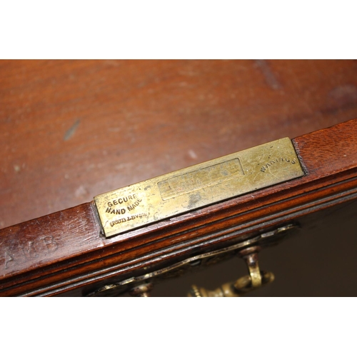 127 - A Victorian leather topped library table/ desk with 2 drawers on ball casters - lock stamped Warings... 