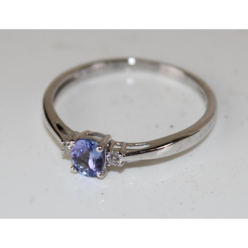 1270 - A 9ct white gold, diamond and Tanzanite ring in box - size R 1/2