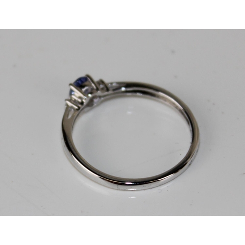 1270 - A 9ct white gold, diamond and Tanzanite ring in box - size R 1/2