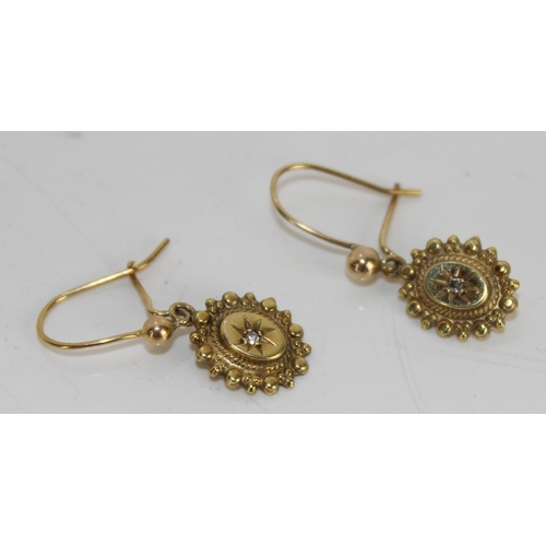 1273 - A pair of yellow metal and diamond drop earrings - tests as 18ct gold or higher but not marked