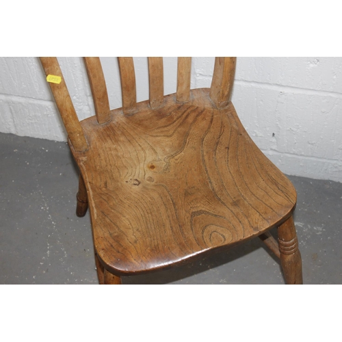 129 - 2 antique Elm seated slat backed chairs