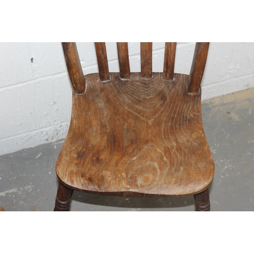 129 - 2 antique Elm seated slat backed chairs