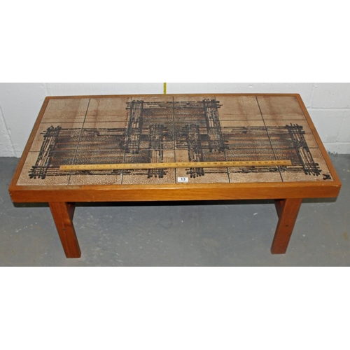 13 - A Danish retro tile topped coffee table by Trioh