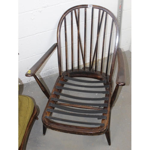 131 - A vintage 1960's Ercol armchair and footstool - previously blonde